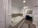 Bright bathroom featuring a soaking tub at 104 Woden Way, Winter Haven, FL 33884