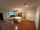 Bedroom with a bunk bed with hardwood floors at 104 Woden Way, Winter Haven, FL 33884