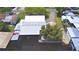 Overhead shot showcases docks, neighborhood, and access to deep, still water in a stunning aerial perspective at 117 Bream St, Haines City, FL 33844