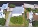 Aerial view of the property, showcasing its location and proximity to the water, and surrounding neighborhood at 117 Bream St, Haines City, FL 33844