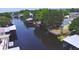 Aerial shot of waterfront homes showcasing calm waters and docks for boating enthusiasts at 117 Bream St, Haines City, FL 33844