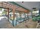Covered dock featuring ceiling fans, water access, and ample space for outdoor seating and entertaining at 117 Bream St, Haines City, FL 33844