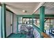 Covered dock area with seating, a ceiling fan and views of boats and the water at 117 Bream St, Haines City, FL 33844