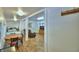 Open-concept living space with dining area, bedroom, and comfortable seating area at 117 Bream St, Haines City, FL 33844