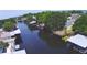 Community waterfront view capturing the waterway with docks, boat houses, and surrounding homes at 117 Bream St, Haines City, FL 33844