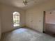 Neutral bedroom featuring carpet, a ceiling fan, a window, and ready to be personalized at 1224 Vienna Square Dr, Winter Haven, FL 33884