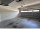 Clean and functional two-car garage with ample space for parking and storage at 1224 Vienna Square Dr, Winter Haven, FL 33884