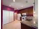 Open kitchen featuring granite counters, stainless appliances, and easy access to the dining area at 1224 Vienna Square Dr, Winter Haven, FL 33884