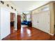 Inviting foyer with a view into the living room and featuring beautiful hardwood floors at 132 Dinner Lake Ave, Lake Wales, FL 33859