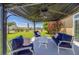 Cozy gazebo featuring comfortable outdoor seating, perfect for relaxing and enjoying the backyard view at 132 Dinner Lake Ave, Lake Wales, FL 33859