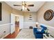 Office featuring a comfortable sofa, desk, and a view into the dining room at 132 Dinner Lake Ave, Lake Wales, FL 33859