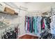 Spacious walk-in closet features wire shelving and racks, offering ample storage at 132 Dinner Lake Ave, Lake Wales, FL 33859