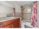 Cozy bathroom with a shower, vanity, and neutral tile at 134 Masterpiece Rd, Lake Wales, FL 33898