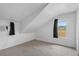 White paneled bedroom with bright light and exterior view at 134 Masterpiece Rd, Lake Wales, FL 33898