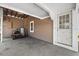 Covered carport featuring space for vehicles, lawn equipment, and access to the home at 134 Masterpiece Rd, Lake Wales, FL 33898