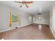 Spacious living room with hardwood floors and lots of natural light at 134 Masterpiece Rd, Lake Wales, FL 33898