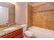 Bathroom showcasing a tiled shower, granite vanity, and modern fixtures at 135 Eloise Oaks Dr, Winter Haven, FL 33884