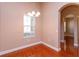 Cozy dining area with hardwood floors and a chandelier at 135 Eloise Oaks Dr, Winter Haven, FL 33884