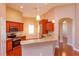 Well-equipped kitchen with stainless steel appliances and a breakfast bar, perfect for casual dining at 135 Eloise Oaks Dr, Winter Haven, FL 33884