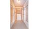 Organized walk-in closet with shelving and drawers at 135 Eloise Oaks Dr, Winter Haven, FL 33884