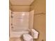 Neutral full bath with a tub, shower and modern toilet at 154 Canna Dr, Davenport, FL 33897
