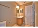 Bathroom features a vanity and a toilet in a neutral color at 154 Canna Dr, Davenport, FL 33897