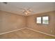 Bedroom featuring two bright windows and neutral walls with carpeted floor at 154 Canna Dr, Davenport, FL 33897
