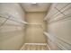 Spacious closet with wire shelving provides ample storage and organization solutions at 154 Canna Dr, Davenport, FL 33897