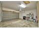 Spacious two-car garage with shelving and plenty of storage space at 154 Canna Dr, Davenport, FL 33897