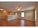Spacious loft area with natural light and wood-look flooring, perfect for entertaining at 154 Canna Dr, Davenport, FL 33897
