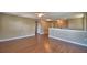 Open loft area showcases wood floors and a versatile living space at 154 Canna Dr, Davenport, FL 33897