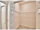 Walk-in closet featuring wire shelving and a neutral palette for an open feel at 1573 Vienna Square Dr, Winter Haven, FL 33884
