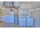 Spacious laundry area with modern washer and dryer at 1573 Vienna Square Dr, Winter Haven, FL 33884