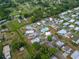 Aerial view of a quaint neighborhood with tree-lined streets and manicured lawns at 1610 Reynolds Rd # 242, Lakeland, FL 33801