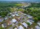 Aerial view of a property, nestled in a charming neighborhood with tree-lined streets at 1610 Reynolds Rd # 242, Lakeland, FL 33801