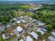 Aerial view of a charming neighborhood with tree-lined streets and manicured lawns at 1610 Reynolds Rd # 242, Lakeland, FL 33801