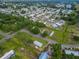 Aerial view of a large neighborhood with tree-lined streets and manicured lawns at 1610 Reynolds Rd # 242, Lakeland, FL 33801