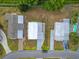 Top-down view of homes featuring manicured lawns and driveways at 1610 Reynolds Rd # 242, Lakeland, FL 33801