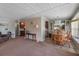 Inviting open-concept living area that connects the living room, dining room, and kitchen at 1610 Reynolds Rd # 242, Lakeland, FL 33801