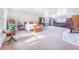 Bright, airy bedroom with a seating area and a view at 1646 Tyner Rd, Haines City, FL 33844