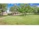 Spacious home on a large lot with mature trees and a well-maintained lawn at 1646 Tyner Rd, Haines City, FL 33844