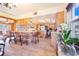 Eat-in kitchen with wood cabinetry, a central island, stainless steel appliances, and lots of natural light at 1646 Tyner Rd, Haines City, FL 33844