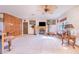 Spacious living room featuring fireplace, tile flooring, and fan at 1646 Tyner Rd, Haines City, FL 33844