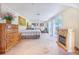 Bright main bedroom suite with decorative fireplace and sliding glass door at 1646 Tyner Rd, Haines City, FL 33844
