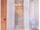 Modern bathroom with a glass-enclosed shower and tiled walls at 1646 Tyner Rd, Haines City, FL 33844