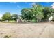 Wide side yard with a storage shed and room for parking or other utilities at 1646 Tyner Rd, Haines City, FL 33844