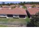 An aerial view of a home featuring a screened patio and fenced yard at 1674 Linz Ct, Winter Haven, FL 33884