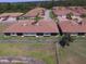 Aerial shot of a single-Gathering home featuring a screened-in patio and fenced yard at 1674 Linz Ct, Winter Haven, FL 33884