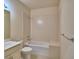 This bathroom features a tub and shower with an integrated seat at 1674 Linz Ct, Winter Haven, FL 33884