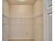 Walk-in closet with shelving and neutral paint at 1674 Linz Ct, Winter Haven, FL 33884